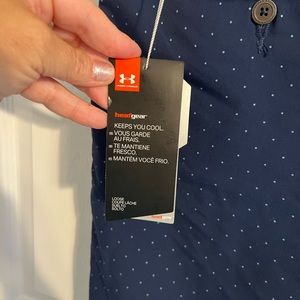 NWT Under Armor size 40.  Flat front, 11 inch inseam, loose fit.